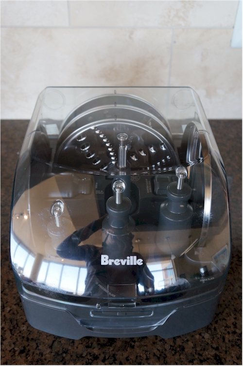The Breville comes with an array of blade/disc attachments.