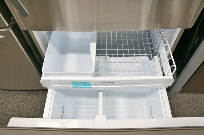The freezer has two drawers for storing food and a factory-installed automatic icemaker.