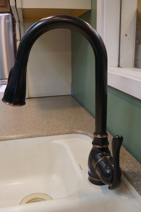The Arbor™ collection features transitional style, gooseneck faucets constructed with metal for durability.