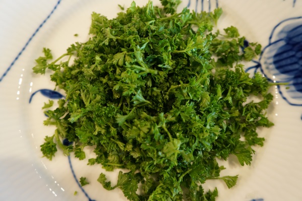 We felt that our parsley emerged from the processor bruised and wet.