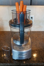Continuously processing carrots through the small feeder tube.
