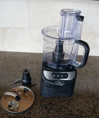 The Oster Total Prep 10-Cup Food Processor.