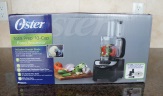Unpacking the Oster Total Prep 10-Cup Food Processor.