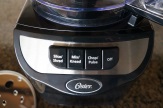 The buttons on the Oster provide several processing options.