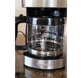 The Kenmore 12-Cup Programmable Aroma Control Coffee Maker uses classic glass carafe and warming plate technology.